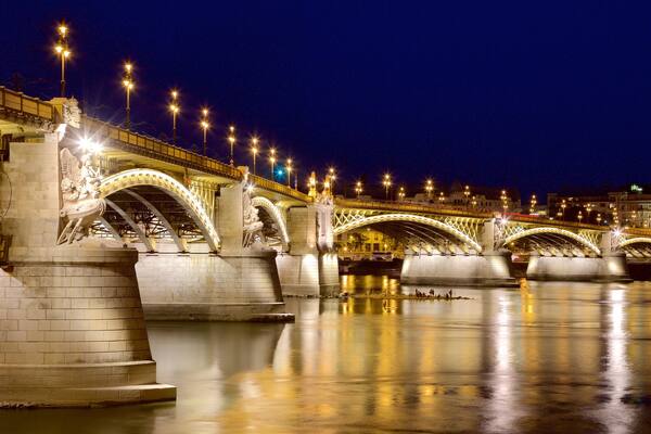 Budapest which includes a river or creek, a bridge and night scenes