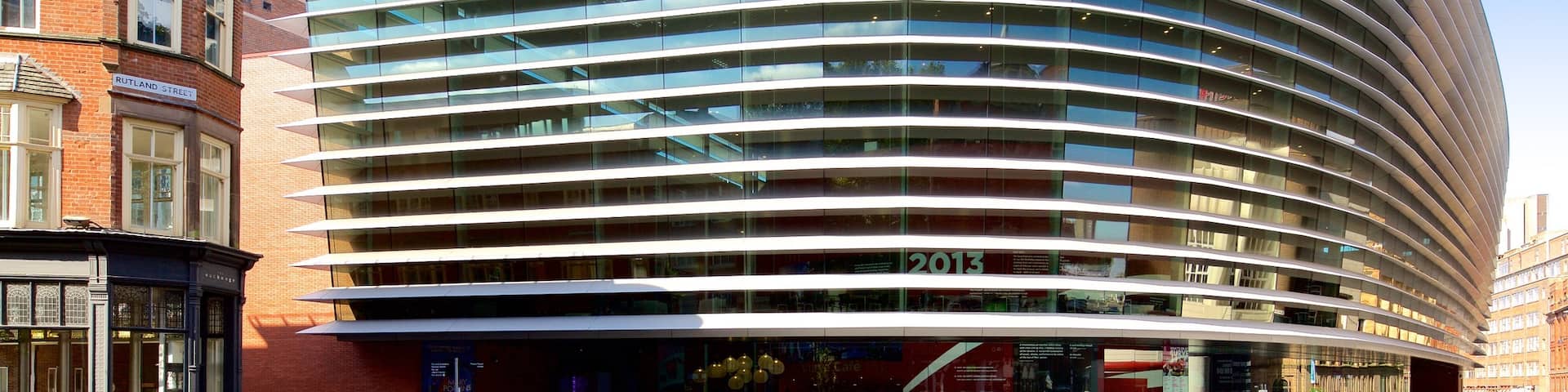Curve Theatre which includes modern architecture and theater scenes