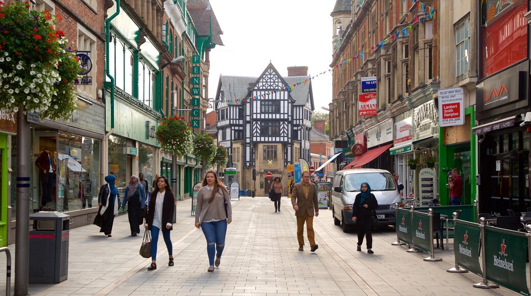 Leicester which includes a city and street scenes as well as a small group of people