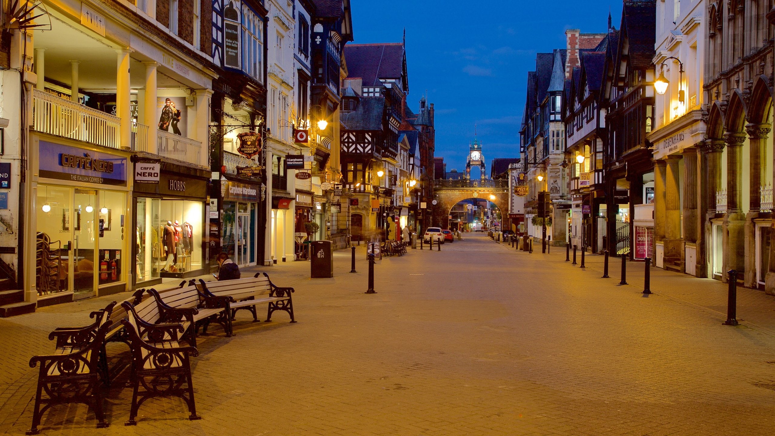 Chester which includes night scenes, a city and street scenes