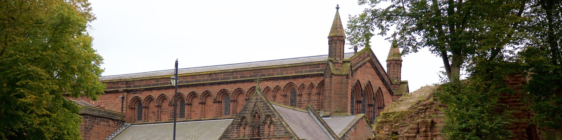 Roman Amphitheatre showing a church or cathedral, heritage architecture and a bridge