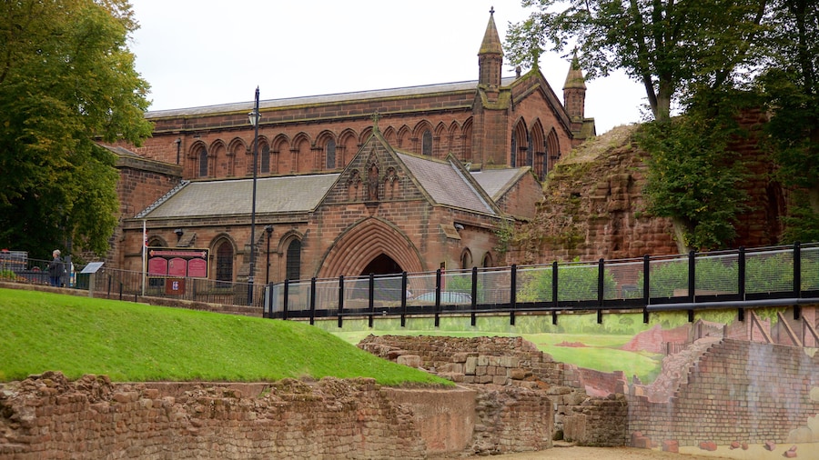 Roman Amphitheatre showing a church or cathedral, heritage architecture and a bridge