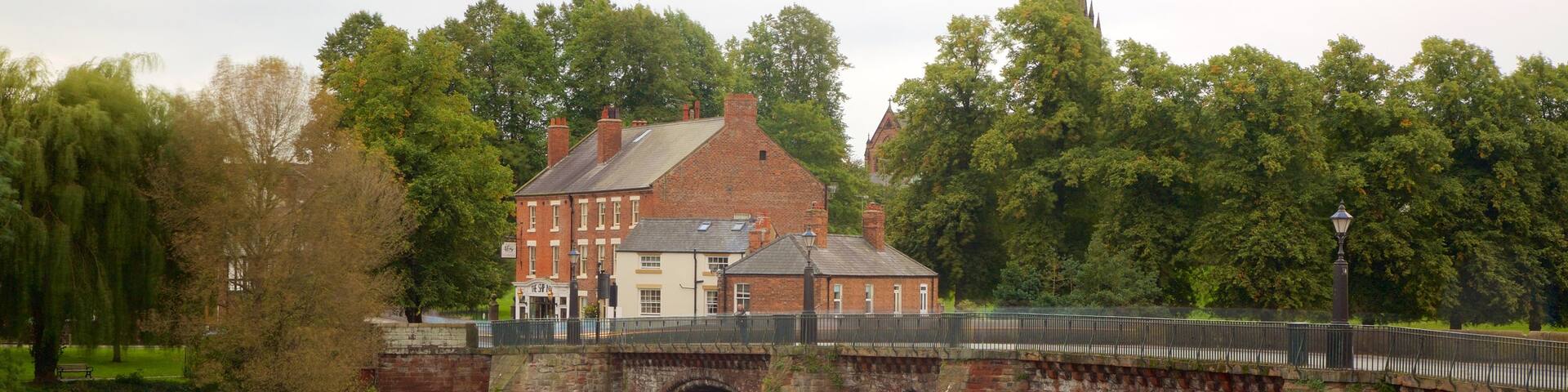 Old Dee Bridge showing a bridge, a river or creek and heritage elements