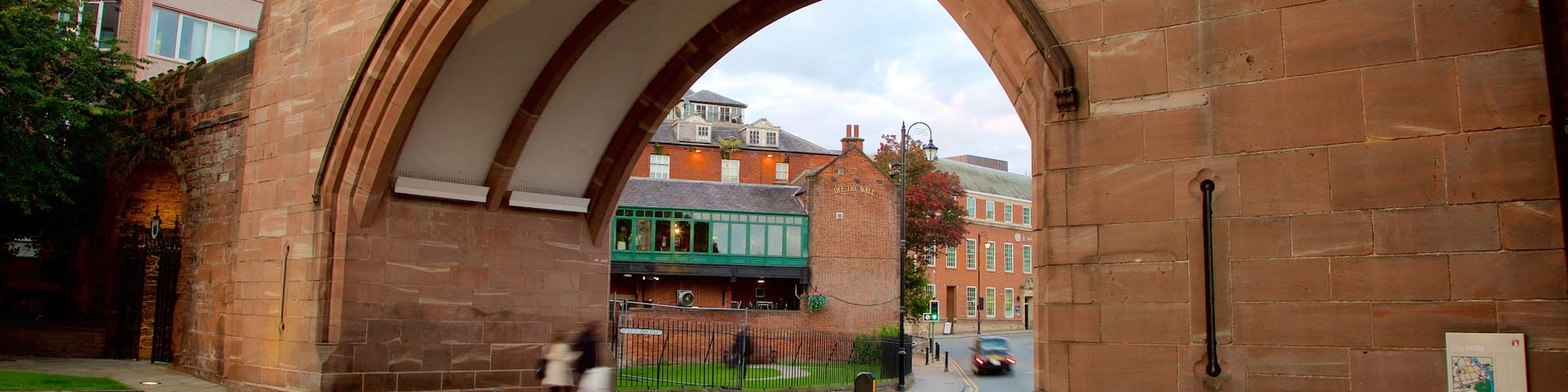 Chester City Walls showing a bridge and heritage elements