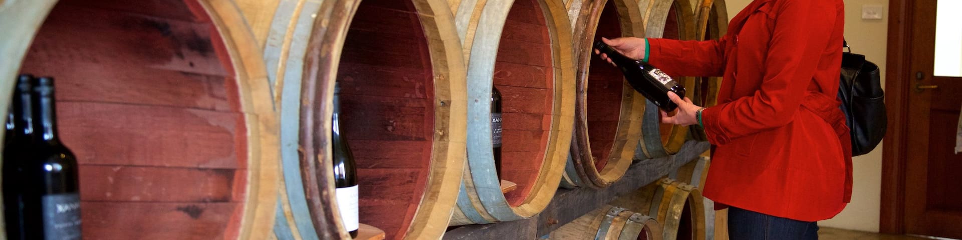 Xanadu Winery which includes interior views and signage as well as an individual female