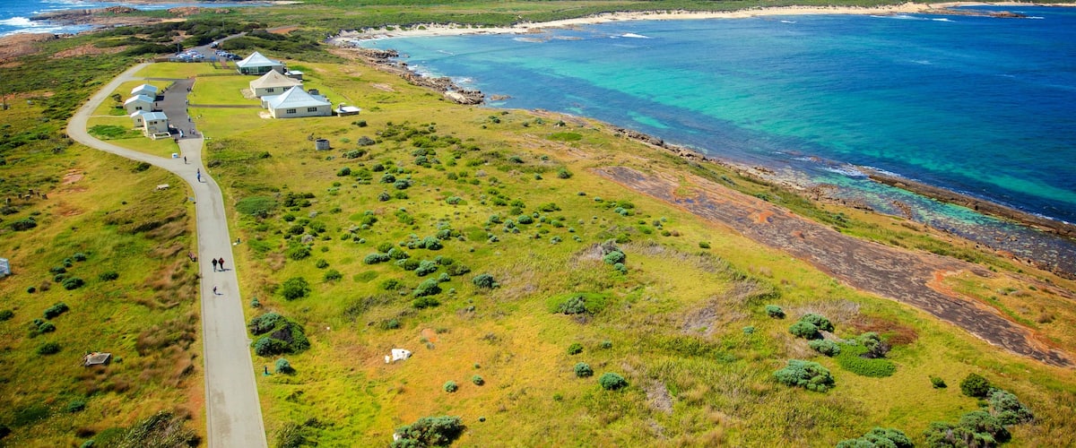 Cape Leeuwin Lighthouse showing a small town or village, a beach and street scenes