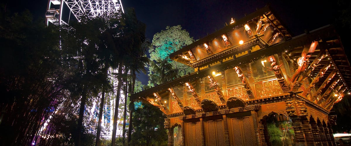 South Bank showing a temple or place of worship, modern architecture and night scenes