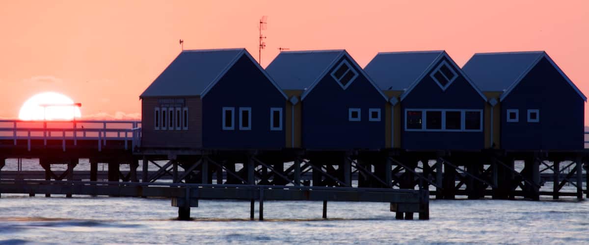 Busselton Jetty showing general coastal views and a sunset