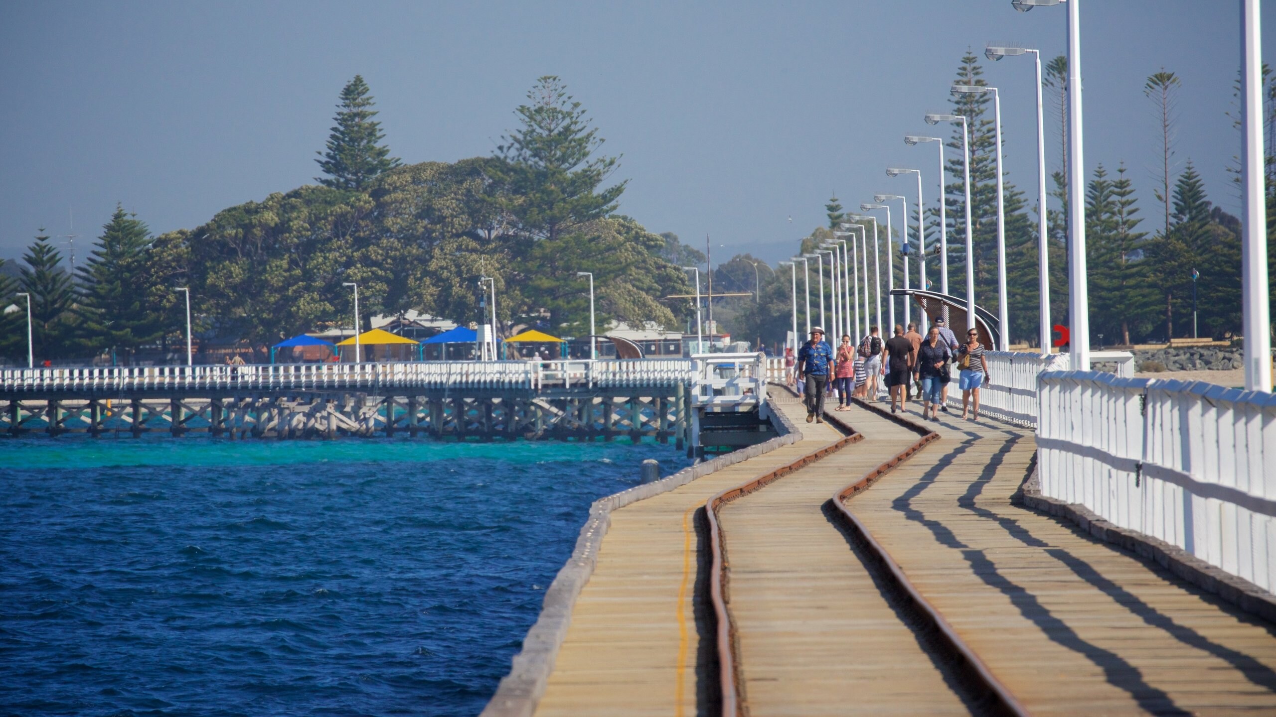 Busselton which includes general coastal views as well as a small group of people