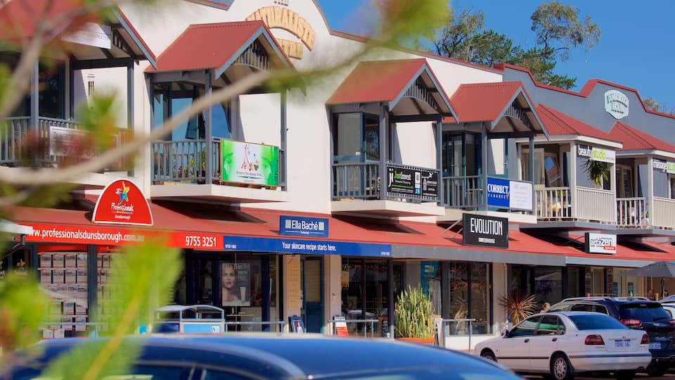 Dunsborough featuring signage and a small town or village