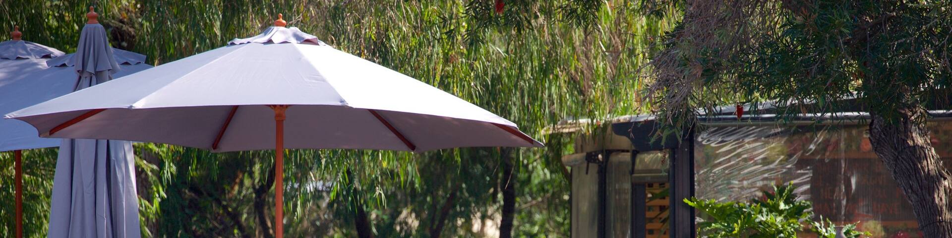 Dunsborough which includes a park and outdoor eating as well as a small group of people