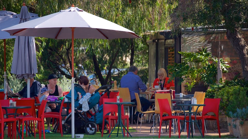 Dunsborough showing a park and outdoor eating as well as a small group of people