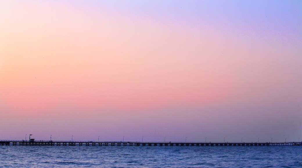 Busselton Jetty showing general coastal views and a sunset