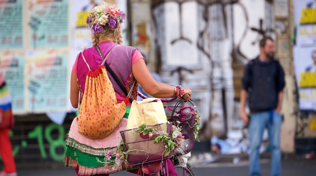 Kreuzberg showing outdoor art as well as an individual female