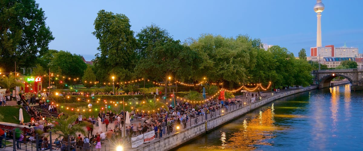 Berlin which includes street scenes and a river or creek as well as a large group of people