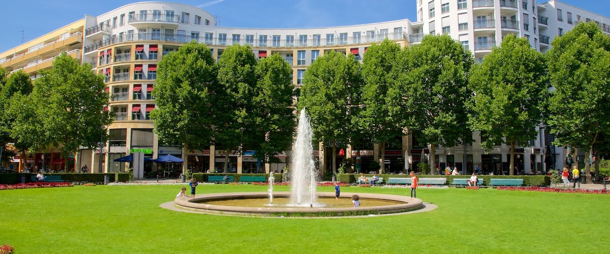 Wilmersdorf das einen Springbrunnen und Garten