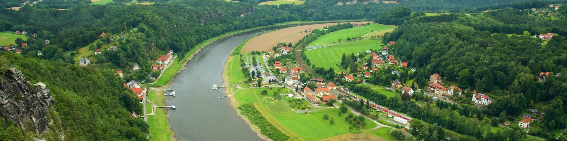 Bad Schandau showing a small town or village, farmland and a river or creek