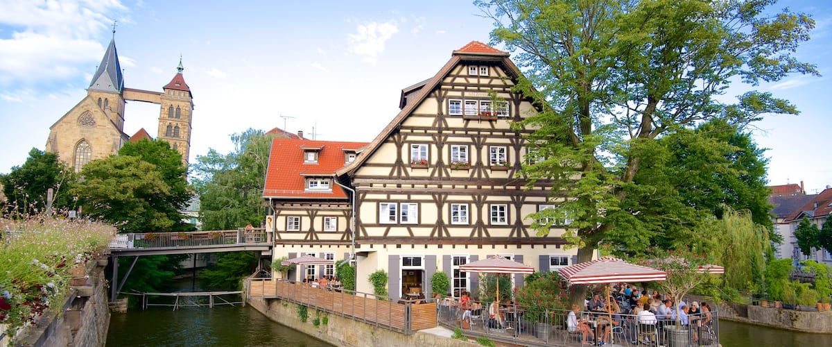 Esslingen mostrando un río o arroyo y comer al aire libre