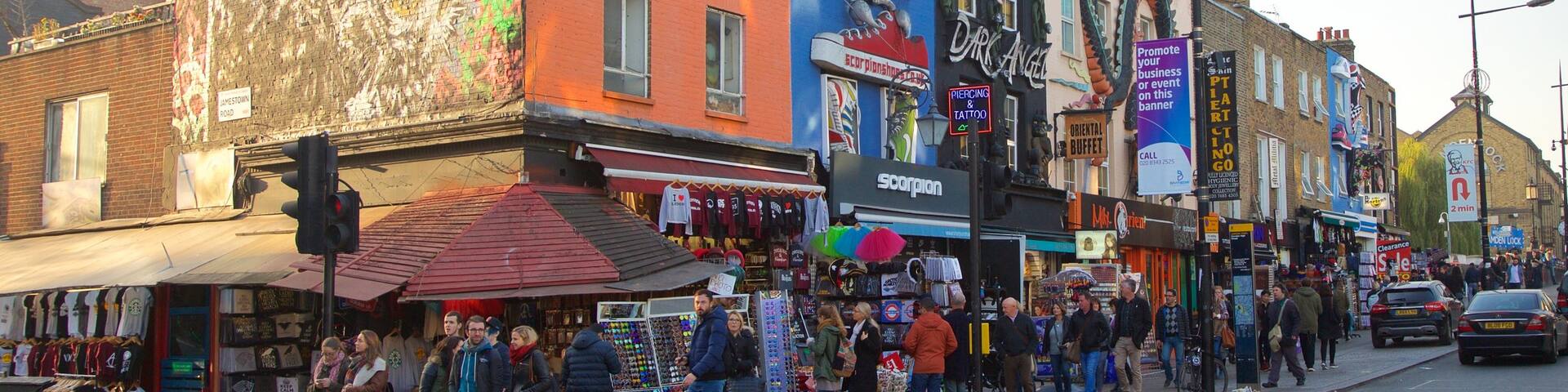 Camden High Street featuring signage, shopping and street scenes