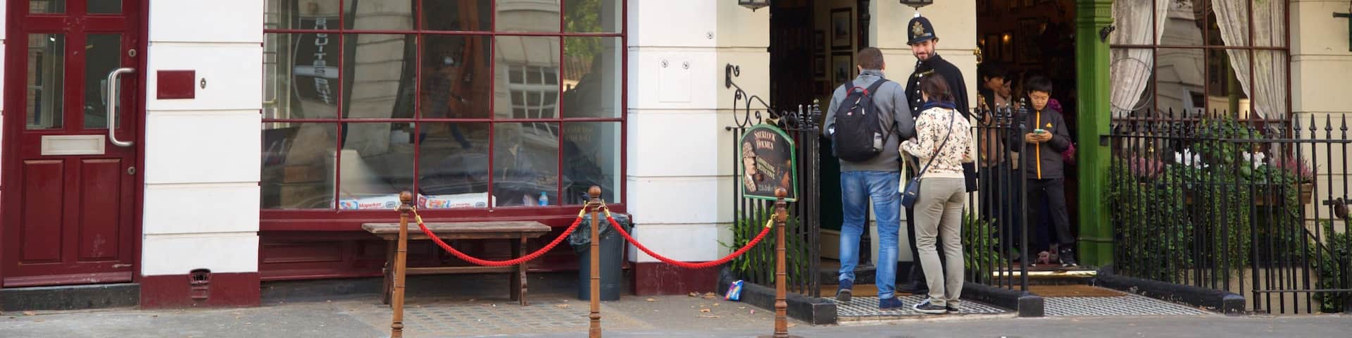 Sherlock Holmes Museum showing signage as well as a small group of people