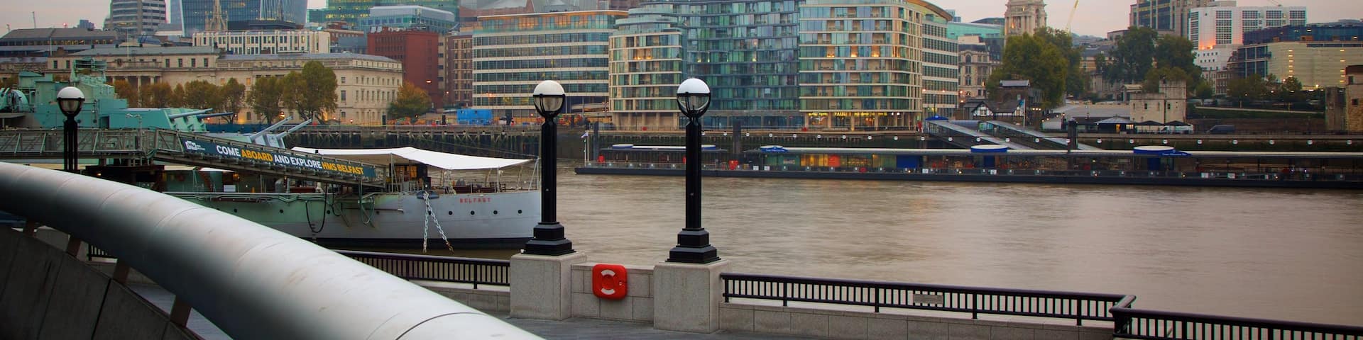 The City of London which includes a skyscraper, heritage architecture and a sunset