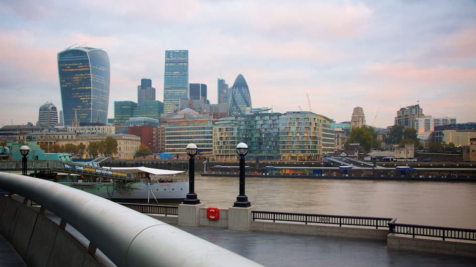 The City of London which includes a skyscraper, heritage architecture and a sunset