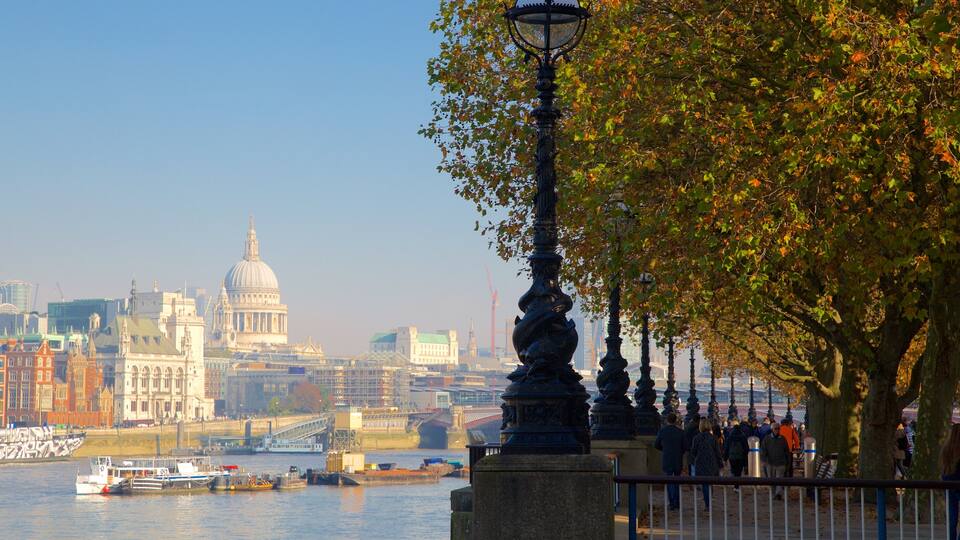 South Bank featuring fall colors, a river or creek and a city