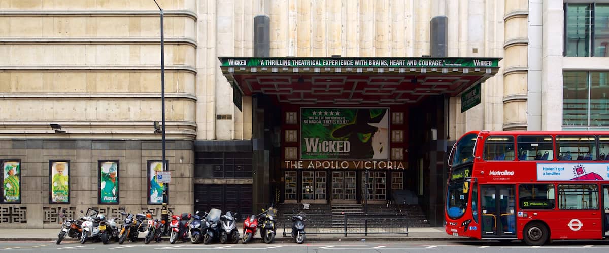 Apollo Victoria Theatre showing signage, theatre scenes and heritage architecture