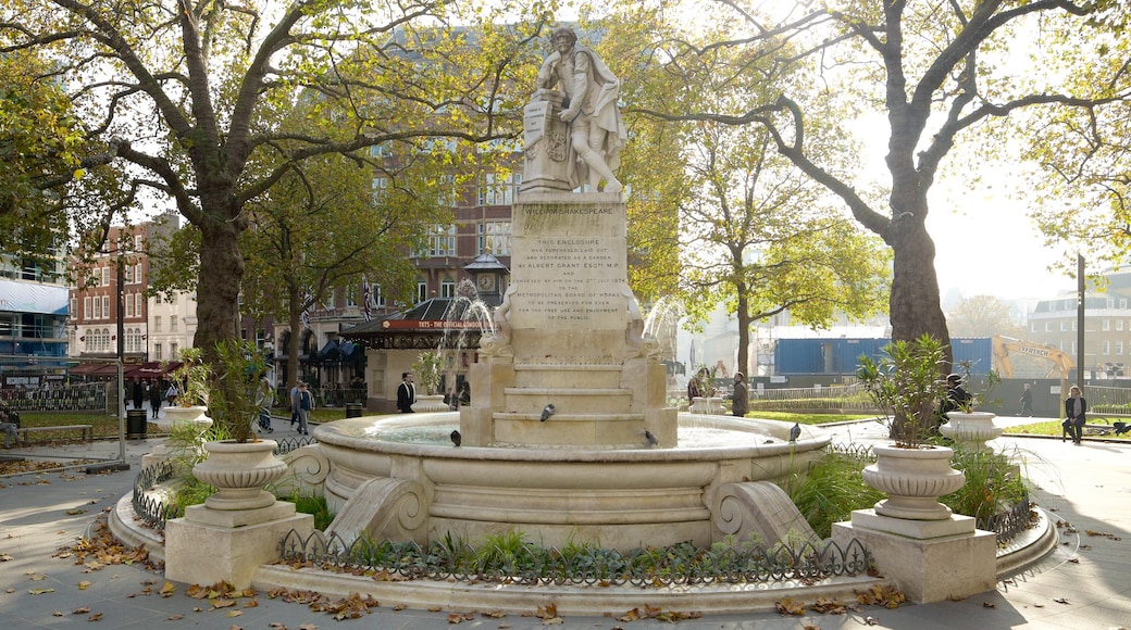 Leicester Square which includes a park and a fountain