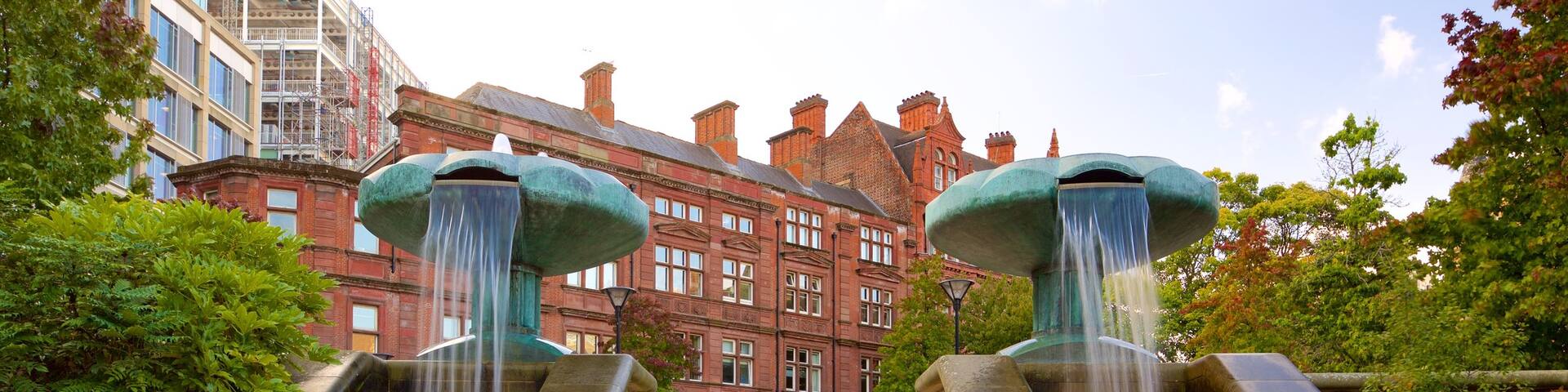 Peace Gardens featuring a park and a fountain