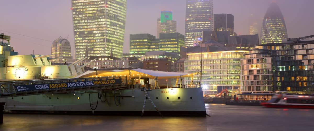 HMS Belfast showing skyline, night scenes and mist or fog
