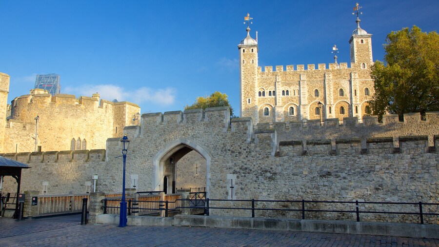Exterior view of the historic Tower of London, showcasing its medieval architecture and iconic fortress walls.