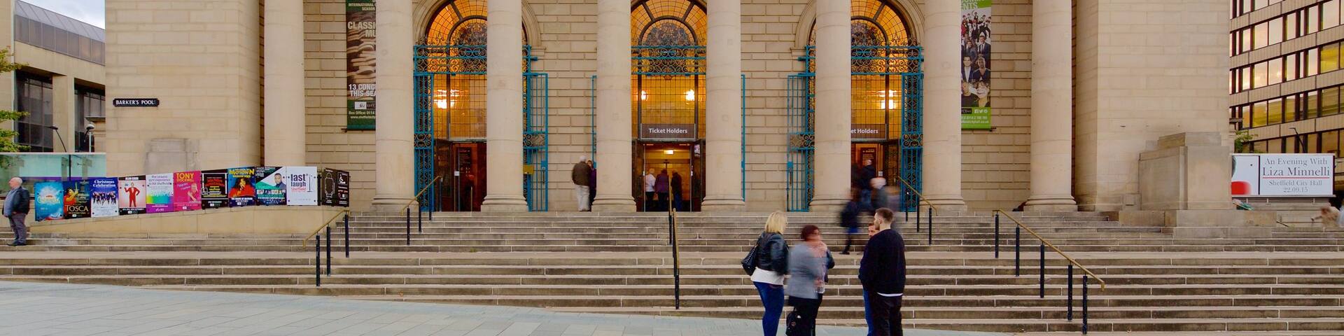 Sheffield City Hall featuring heritage architecture and theatre scenes as well as a small group of people