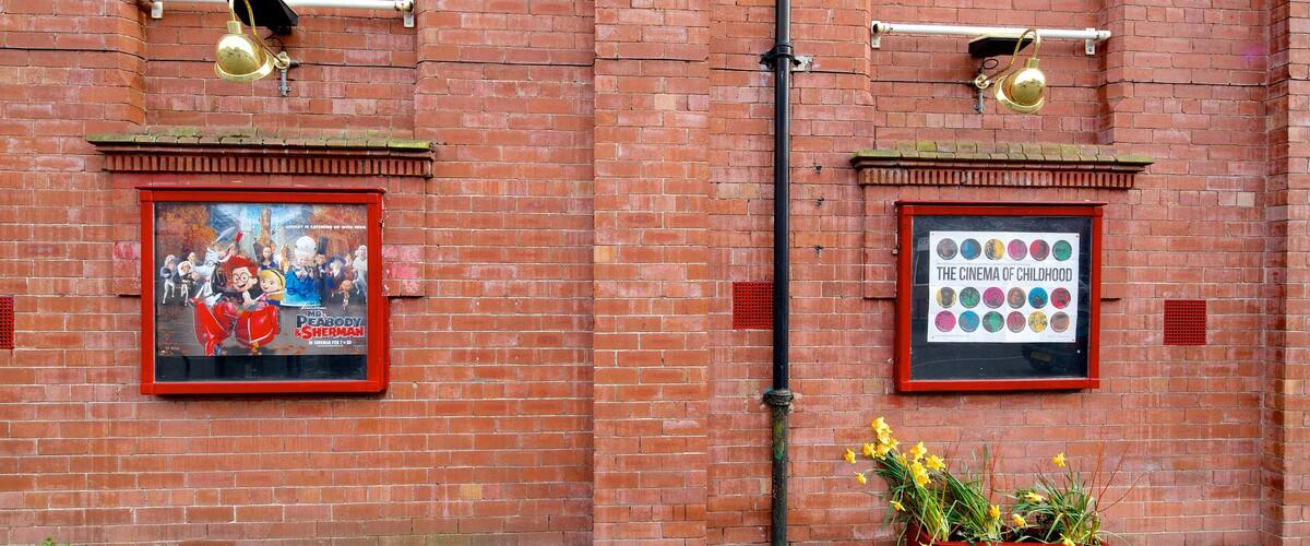 Leeds featuring signage, theater scenes and outdoor art