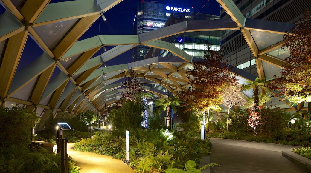 Canary Wharf featuring interior views, night scenes and a park