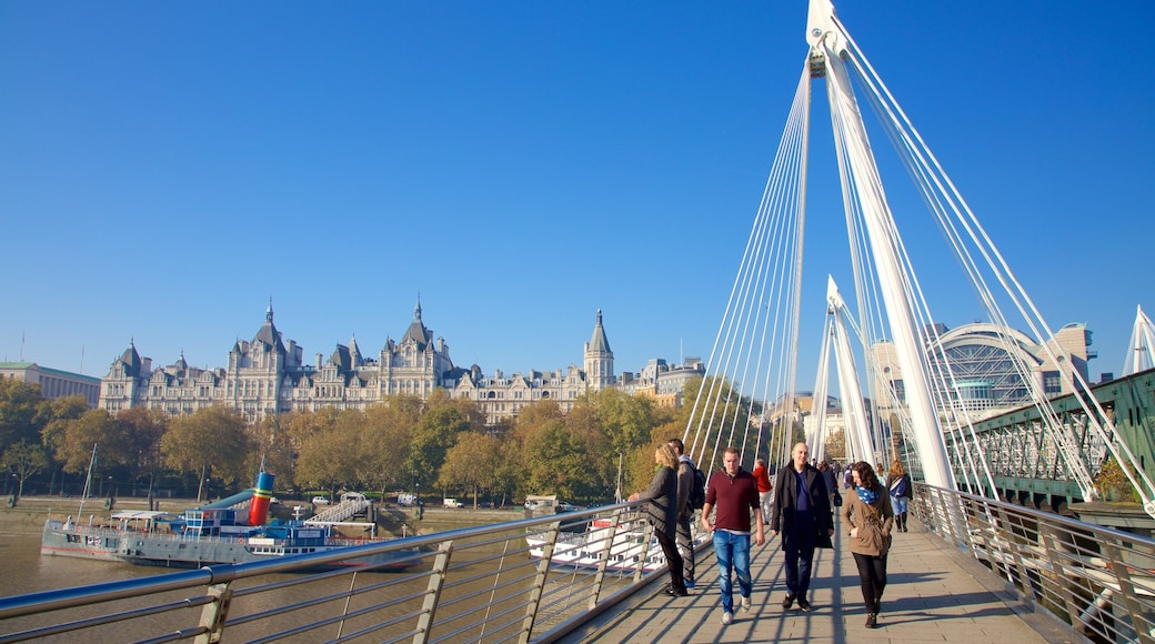 London showing a bridge, château or palace and a river or creek