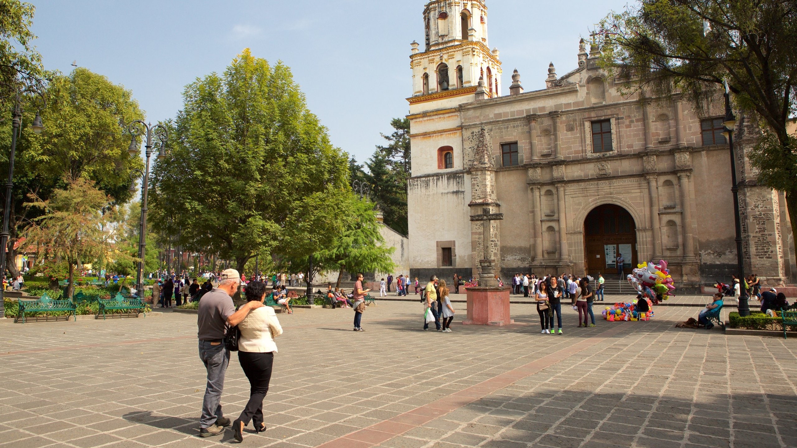 Coyoacan which includes a church or cathedral, heritage architecture and a square or plaza