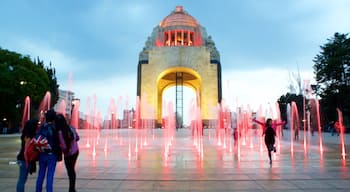 Monument to the Revolution which includes a fountain, night scenes and a monument