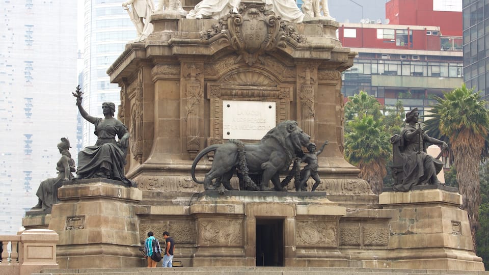 The Angel of Independence Monument featuring a statue or sculpture, heritage elements and a monument