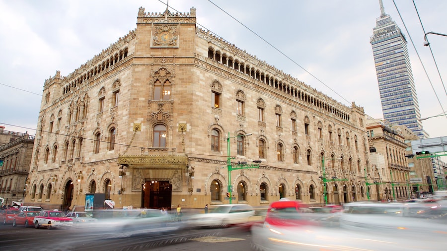 Museo Biblioteca Palacio Postal featuring a castle, heritage architecture and street scenes