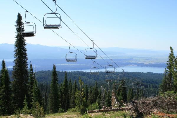Brundage Mountain Ski Area which includes a gondola and forest scenes