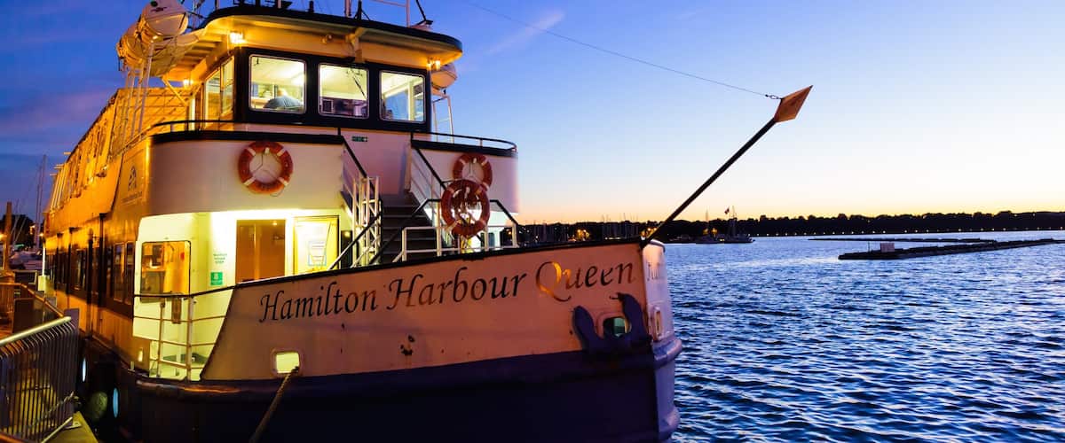 Hamilton featuring general coastal views, night scenes and a sunset