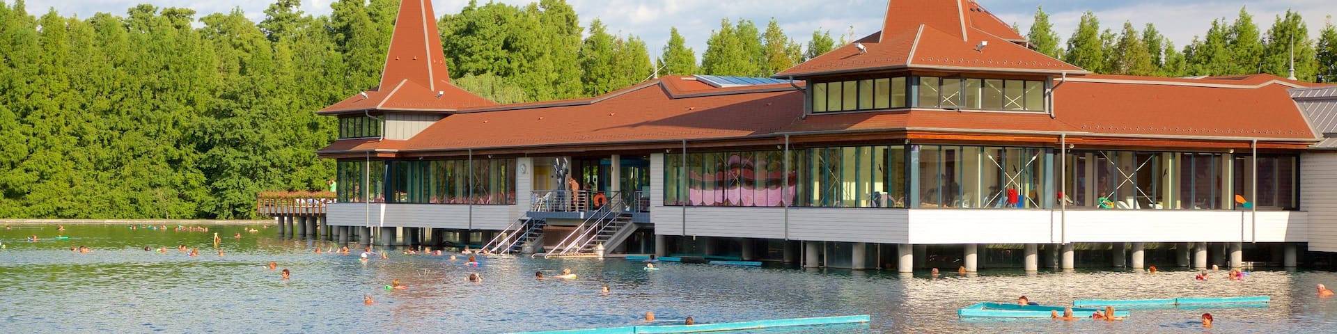 Lake Heviz featuring swimming, a luxury hotel or resort and a lake or waterhole