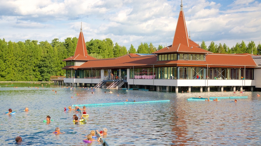 Lake Heviz featuring swimming, a luxury hotel or resort and a lake or waterhole
