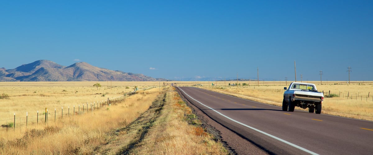 Socorro showing farmland and vehicle touring