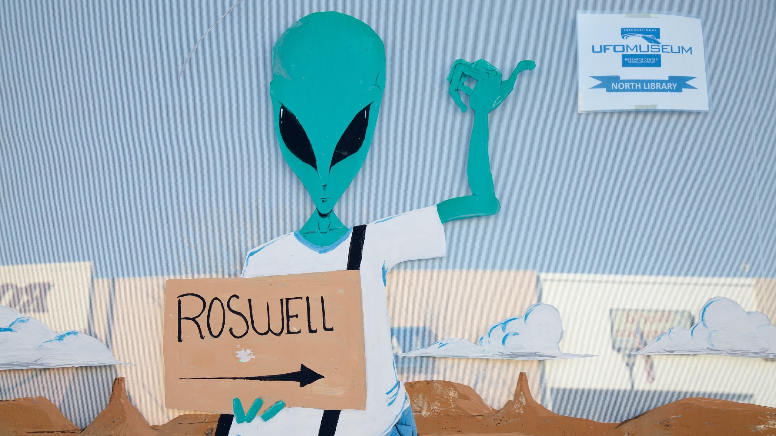 Roswell featuring outdoor art and signage