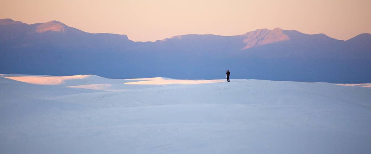 White Sands National Monument featuring desert views and a sunset
