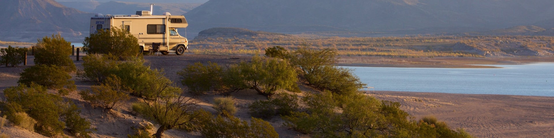 Elephant Butte showing vehicle touring and tranquil scenes