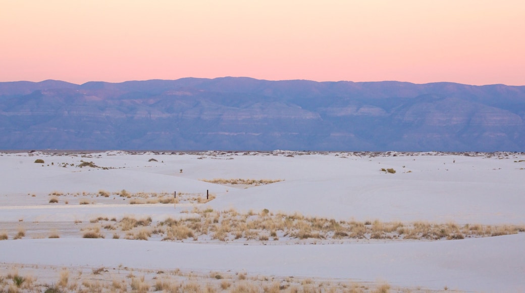 White Sands National Monument showing mountains, a beach and a sunset