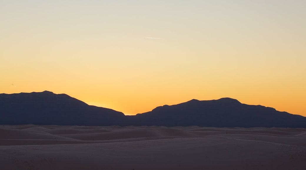 White Sands National Monument which includes mountains and a sunset